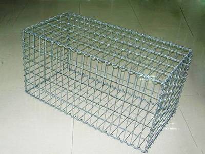 A welded type Galfan gabion box on the ground.