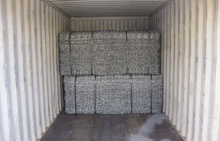 Two large bundles packaged galvanized gabion boxes loaded in the container for delivery to client.